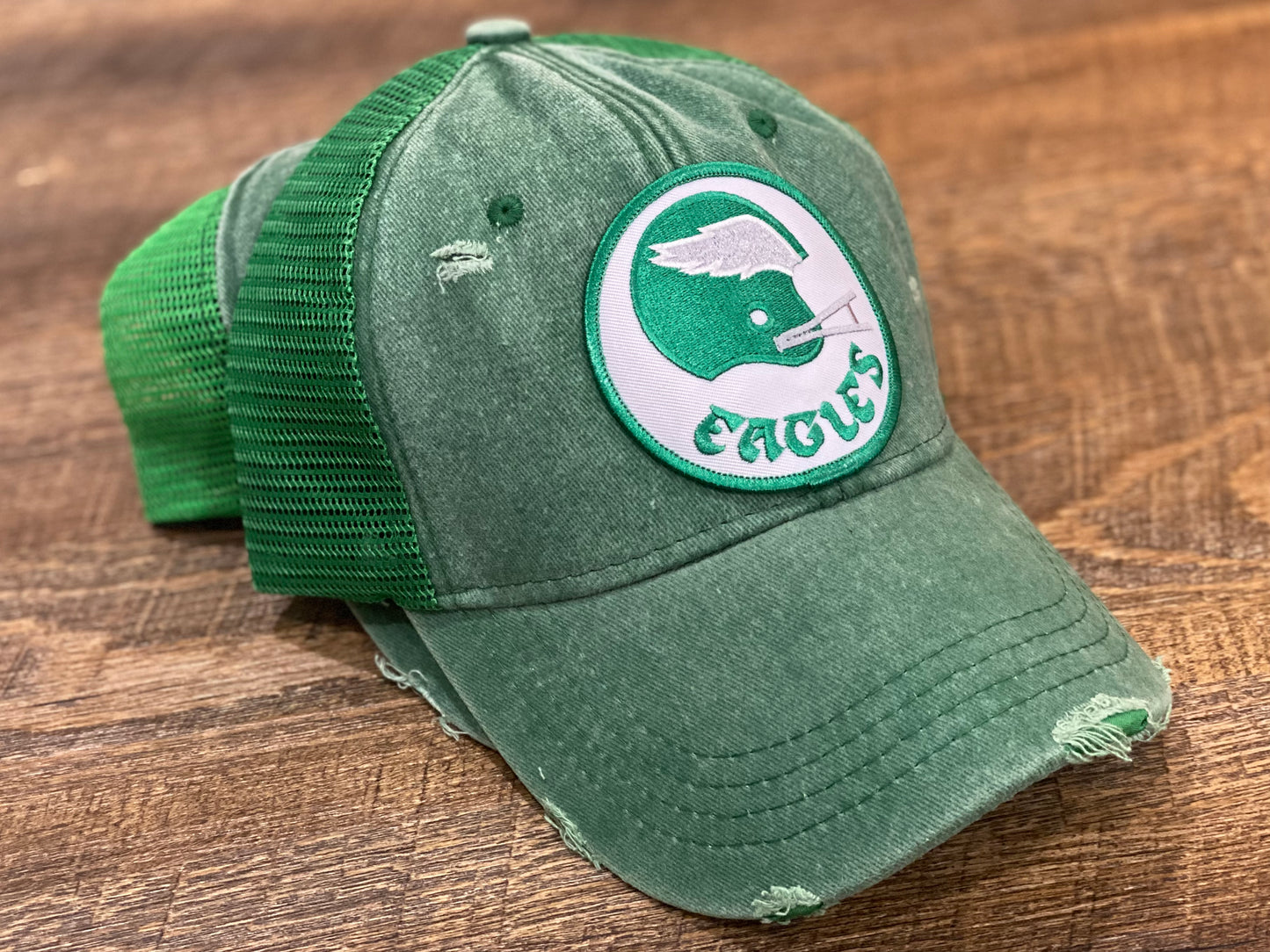 Distressed green trucker hat with patch